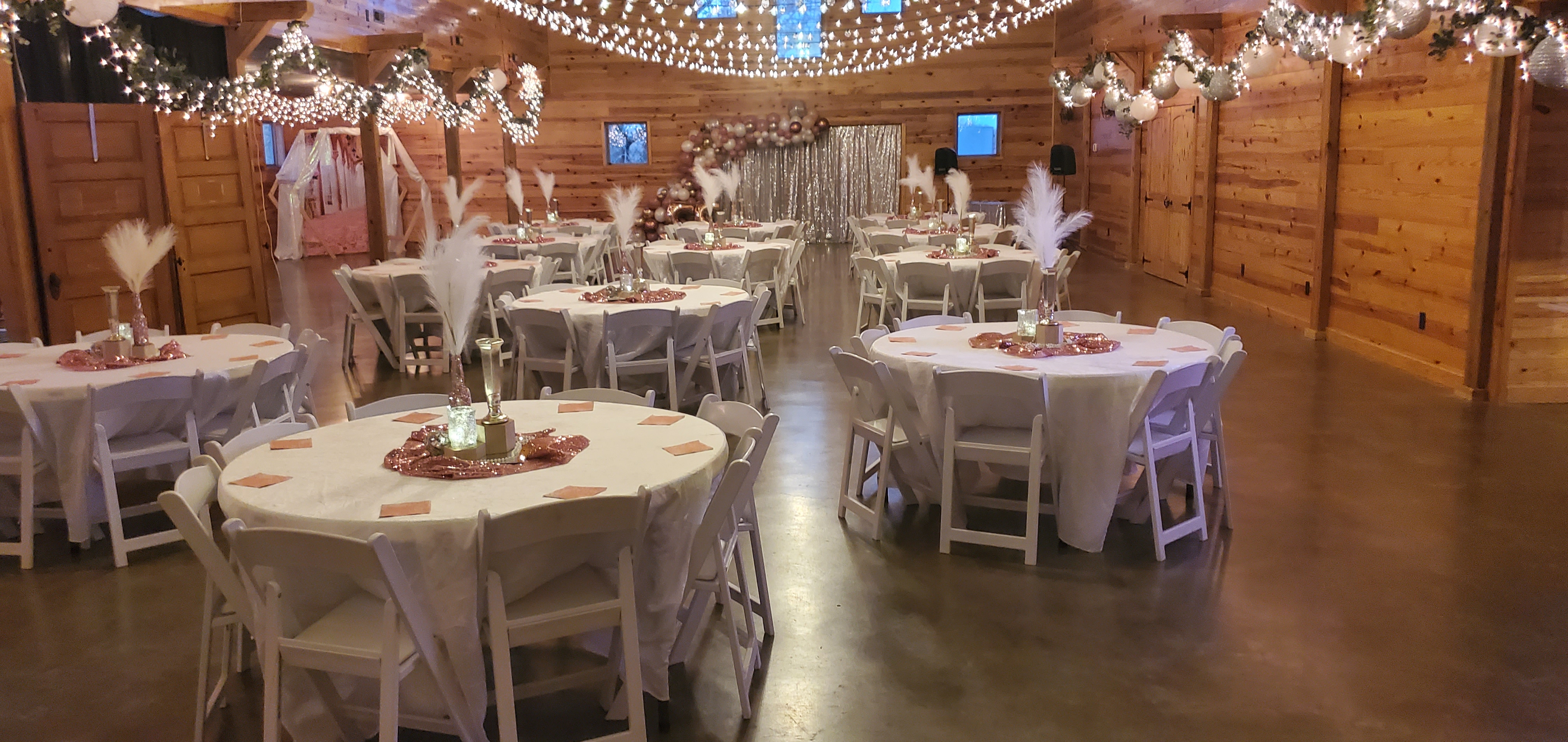 white and pink party decor with disco balls