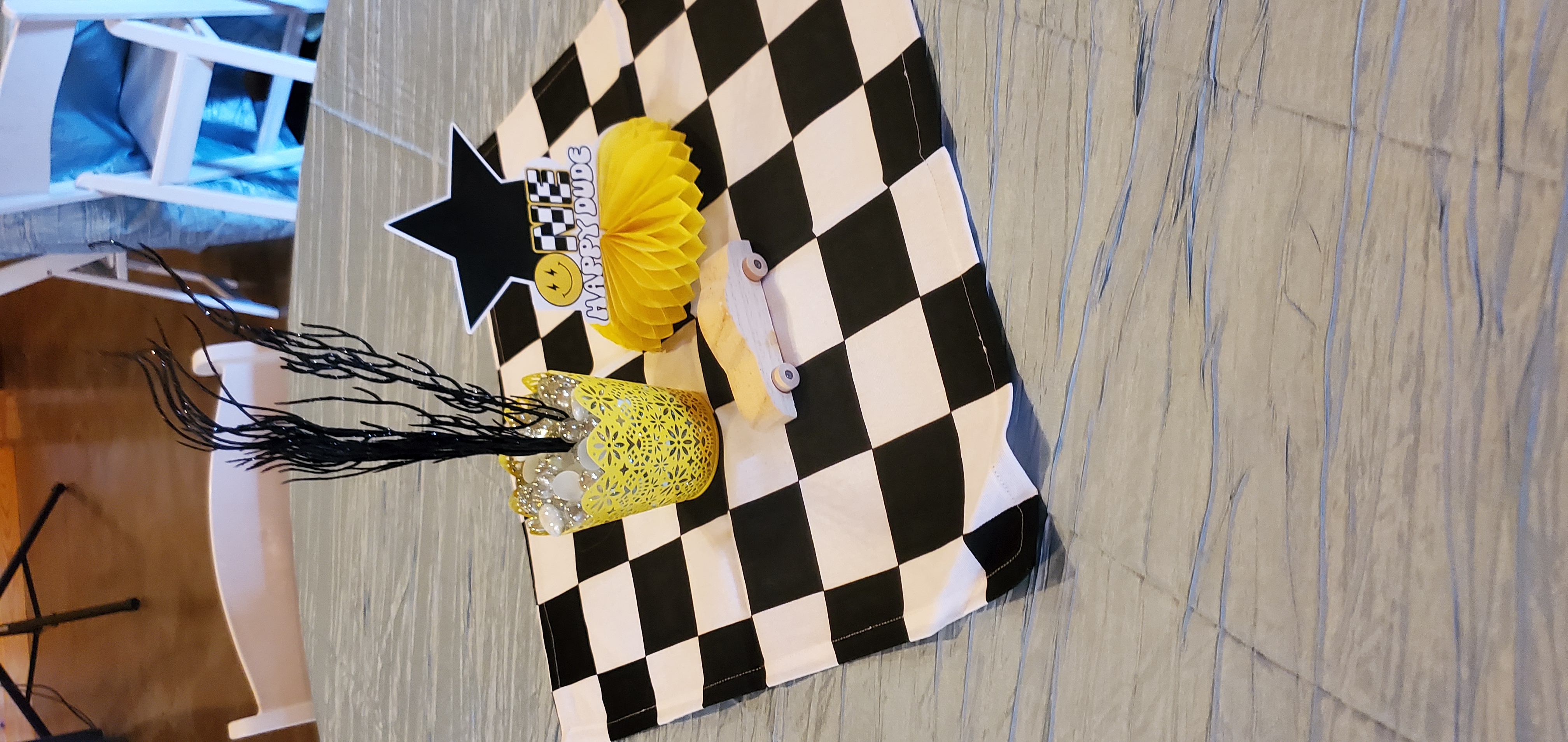 black and white check table centerpiece for first birthday party