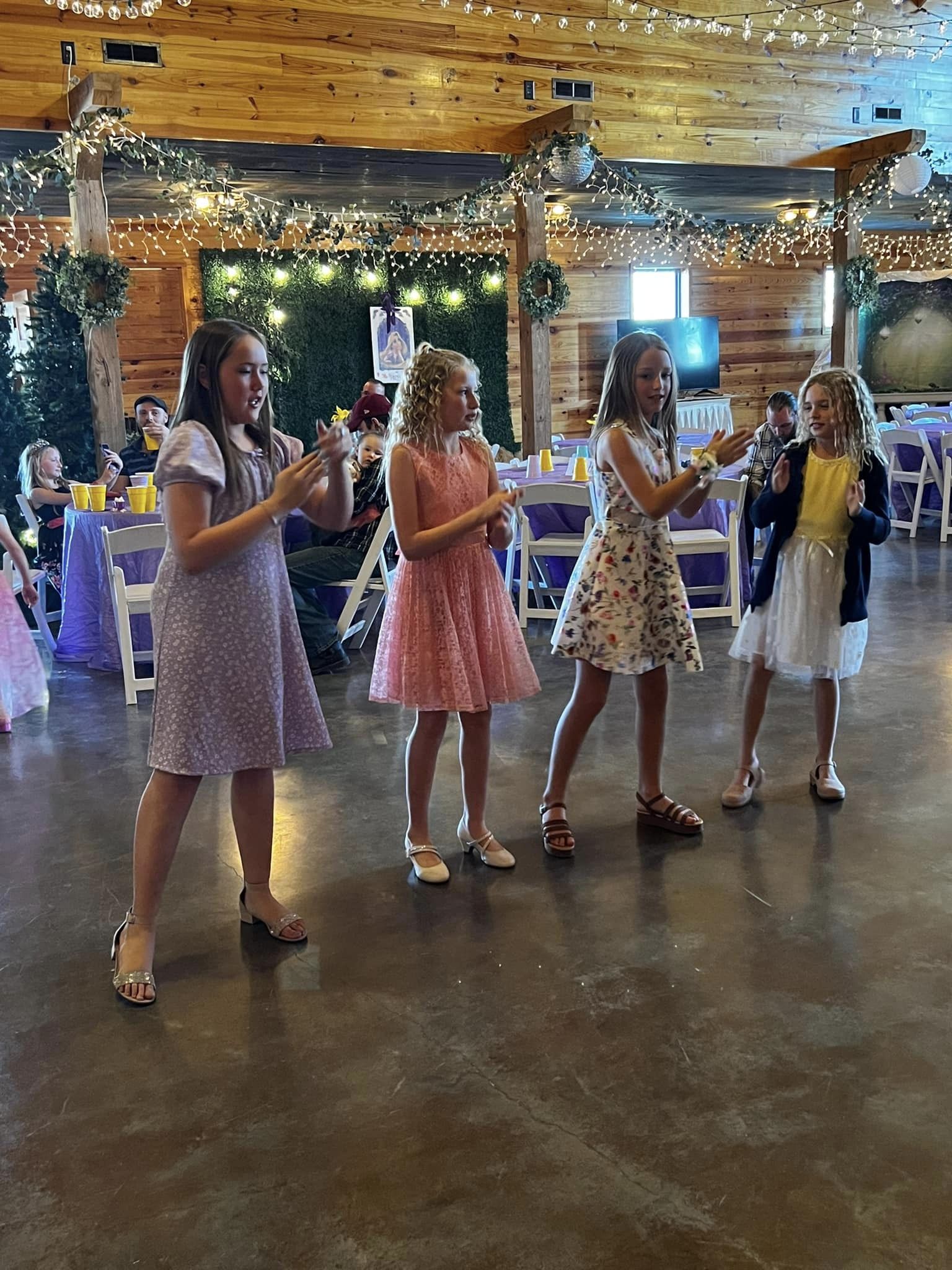 girls dancing at fundraiser event