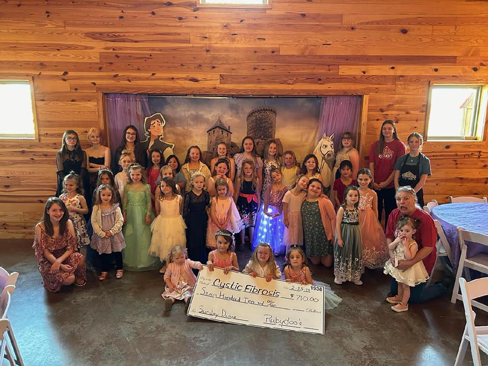 group photo of girls at fundraiser