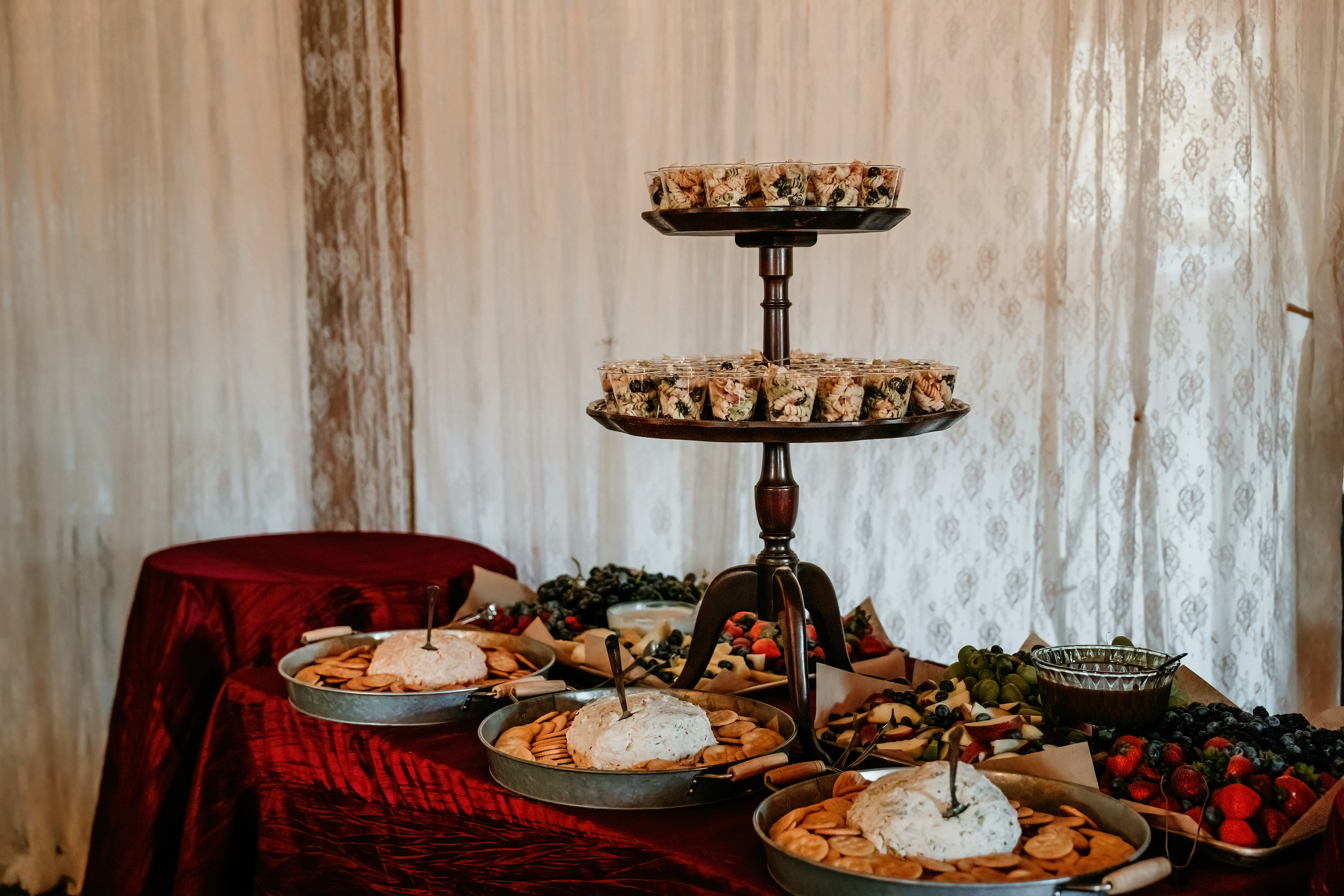assorted hours d'oeuvres on serving trays